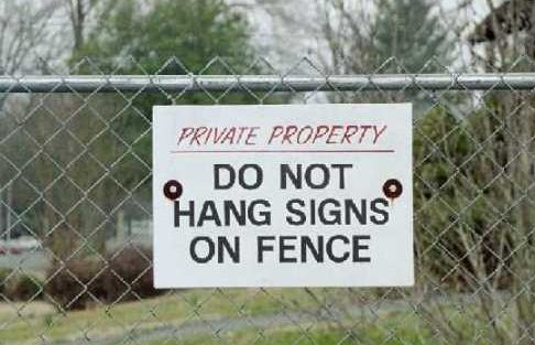 Signs On Fence.jpg
